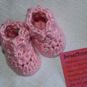 new, hand made, crochet, newborn baby booties in pink